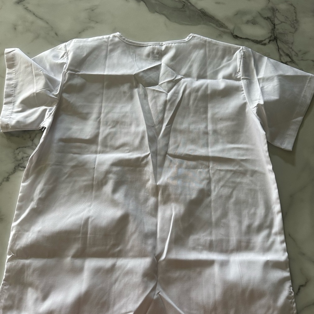 Women’s size medium white scrubs